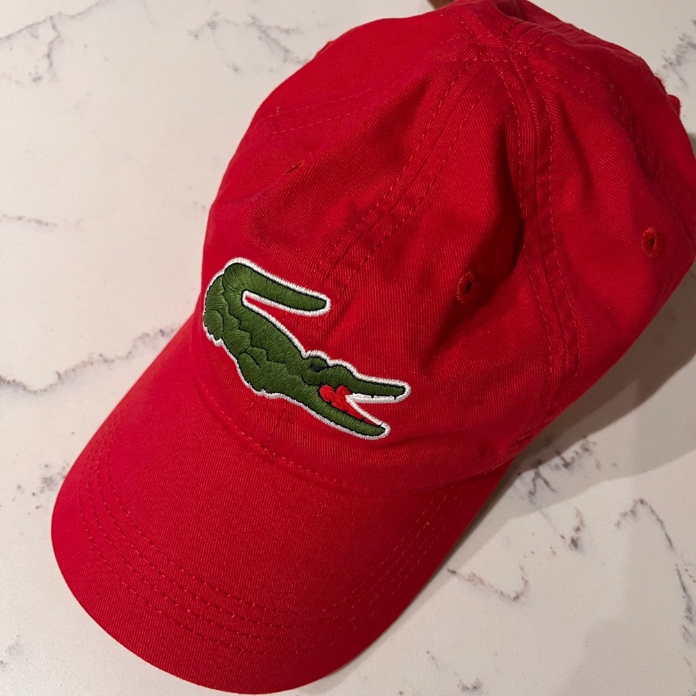 Lacoste Bright Red Hat with Crocodile Emblem and leather strap